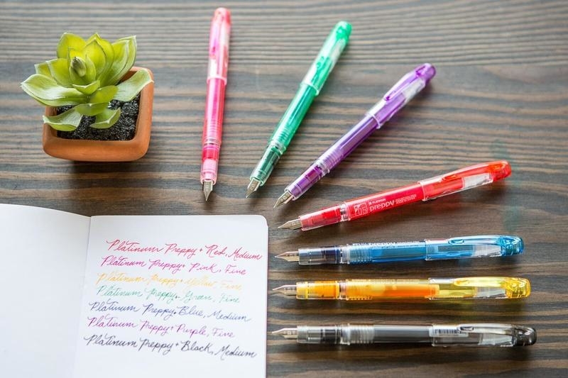 six different colored fountain pens