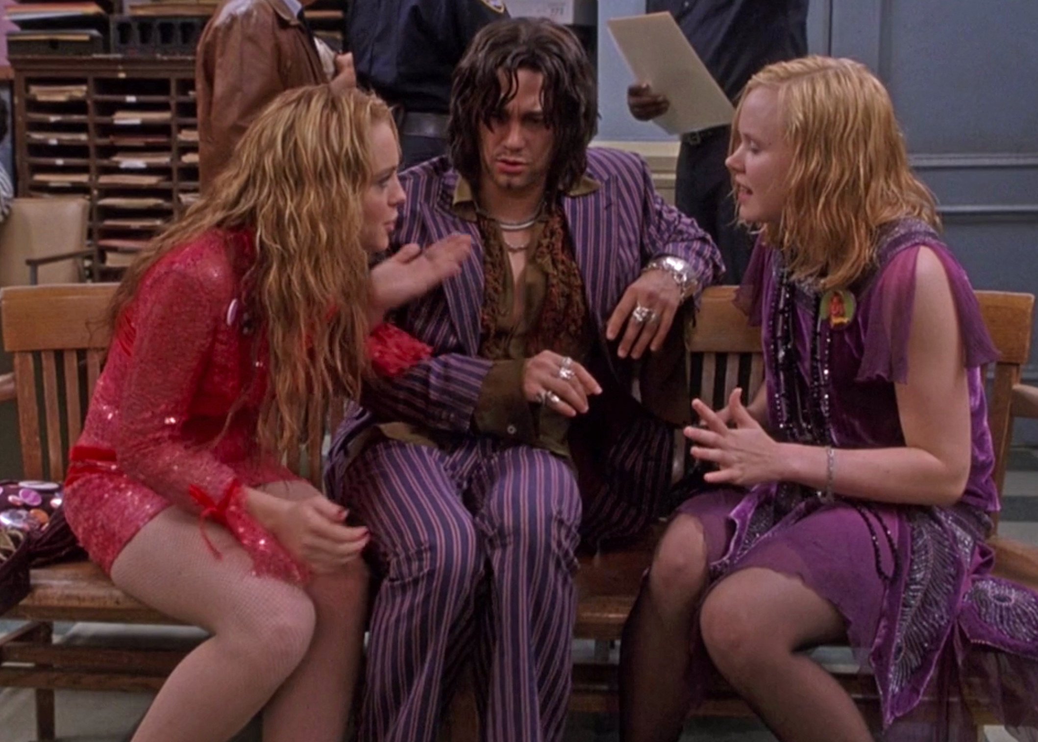 Lindsay Lohan and Alison Pill argue as they sit on as Lola and Ella, while Adam Garcia sits in between them as Stu