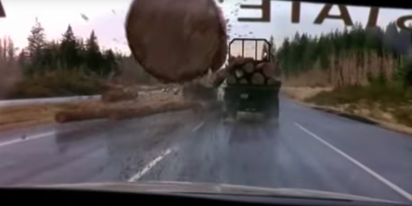 logs falling off a truck
