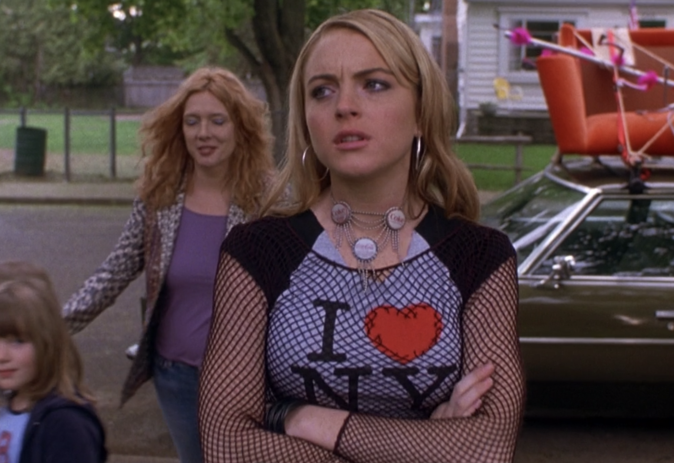 Lindsay Lohan crosses her arms, annoyed, as Lola in &quot;Confessions of a Teenage Drama Queen&quot;