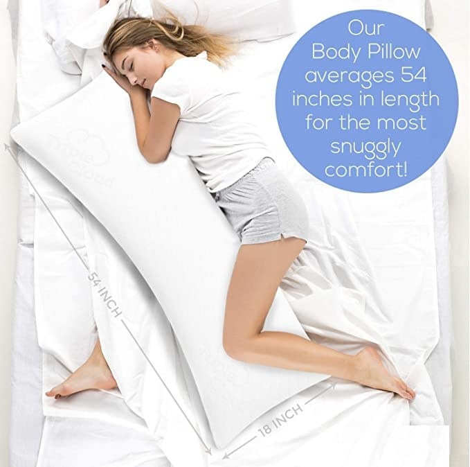 A person sleeping with the body pillow