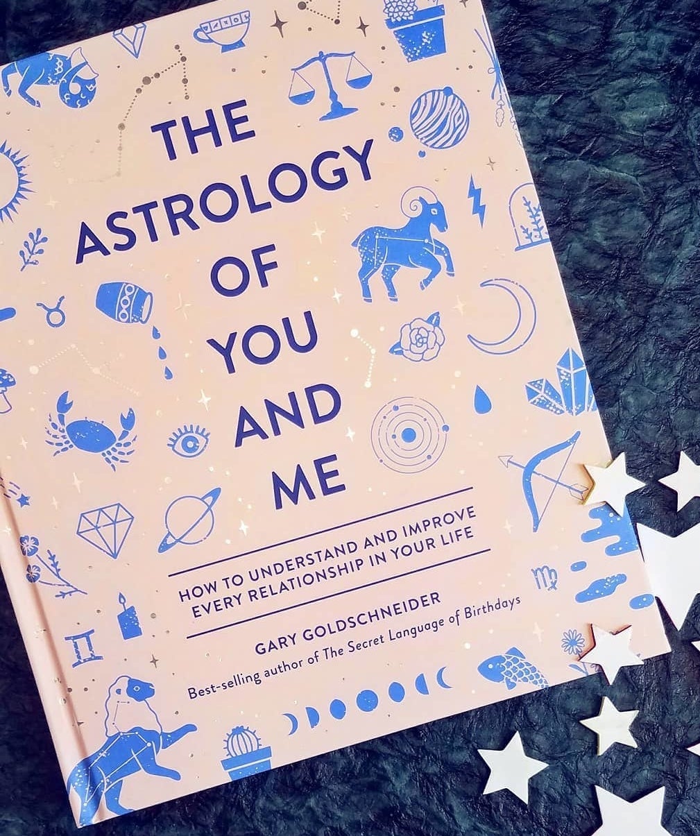 The book with star cut outs on top of if