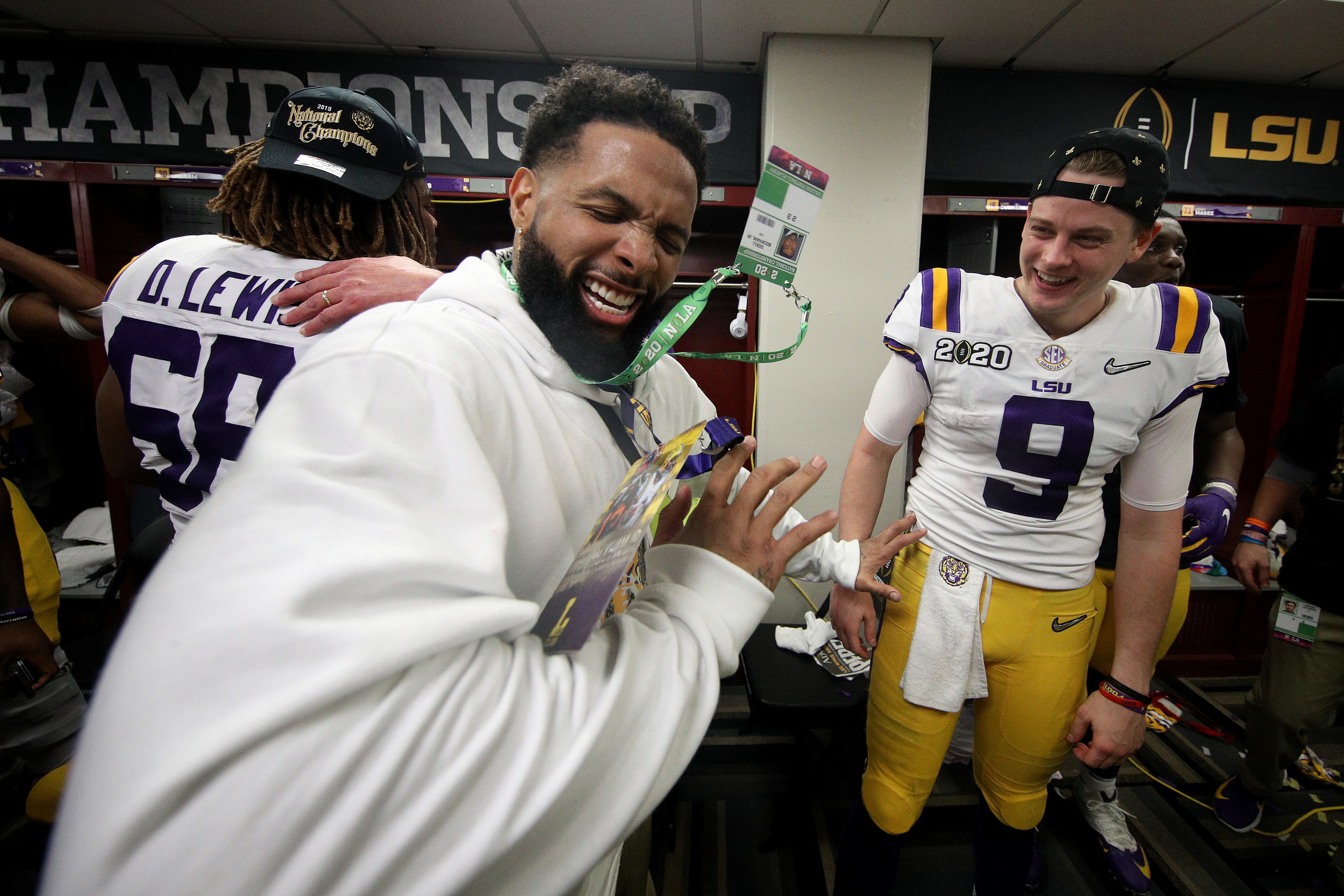 Odell jokes around with his teammates in a locker room