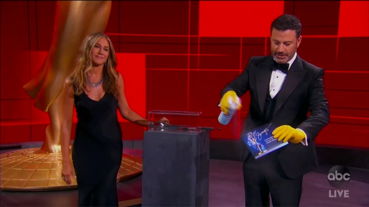 Jimmy spraying the envelope with Lysol