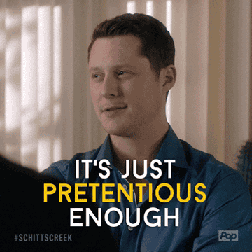 A GIF of Patrick Brewer from Schitt&#x27;s Creek with the text &quot;Just Pretentious Enough.&quot;