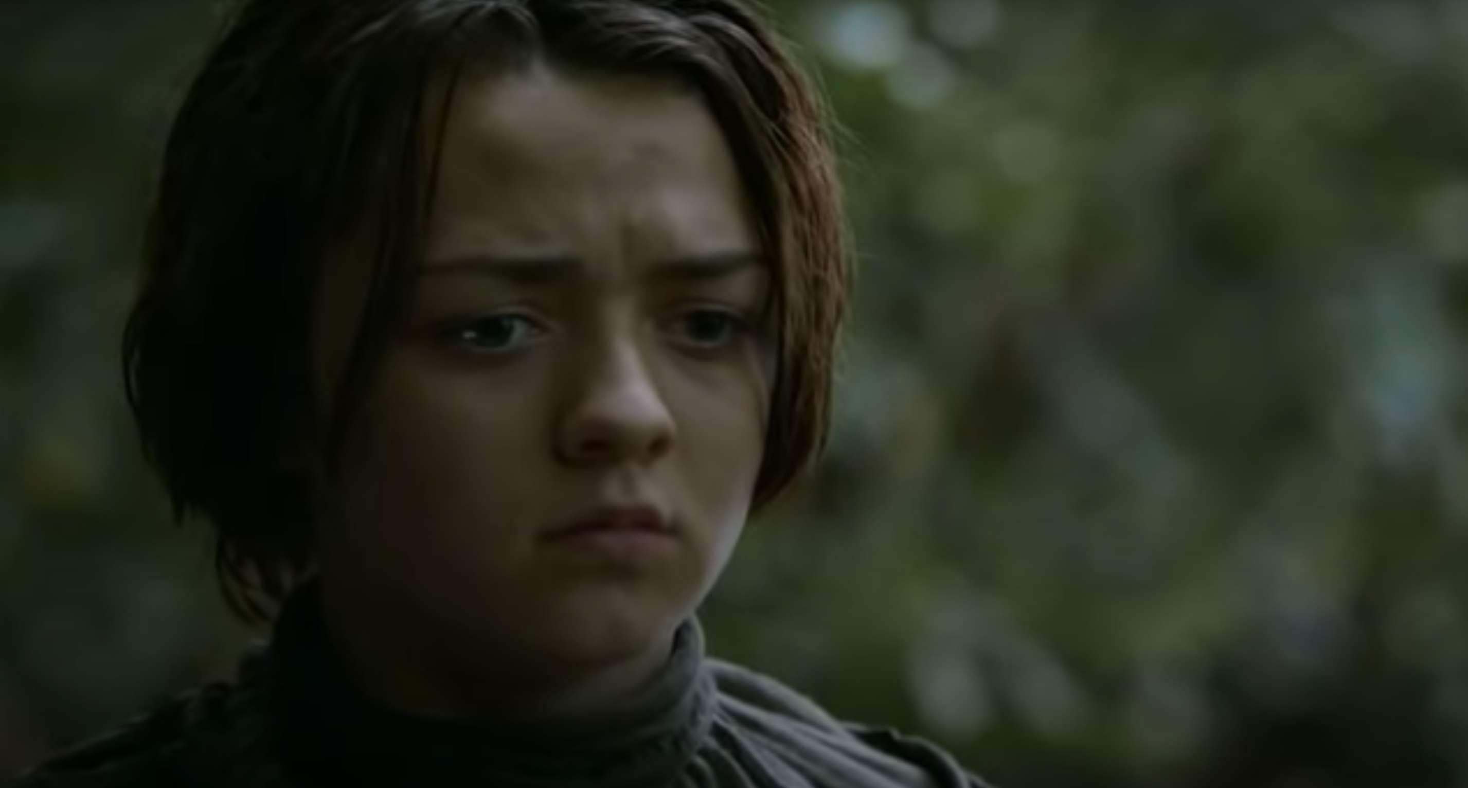 Still from Game of Thrones: Arya stands in the forest