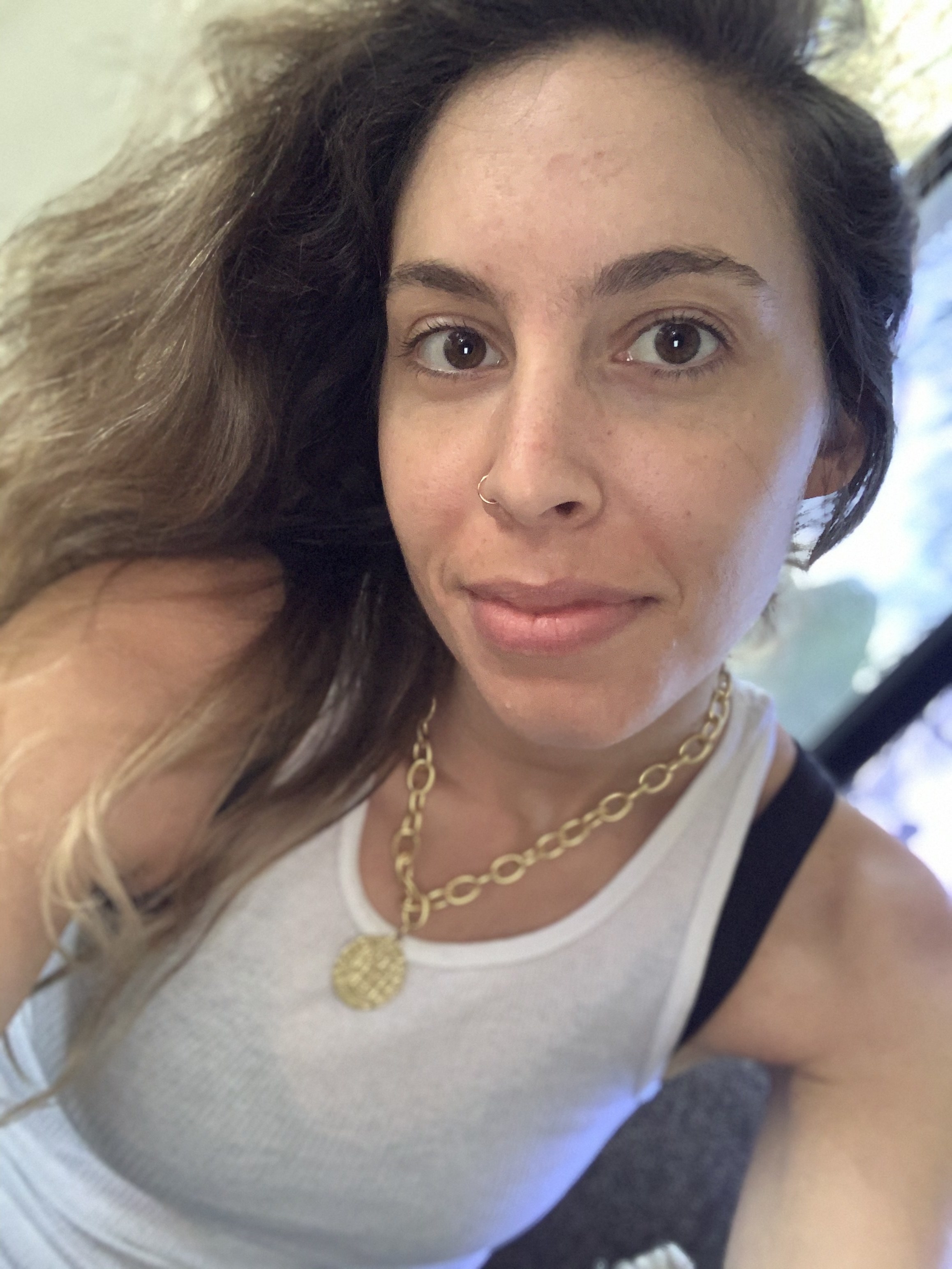 A picture of the author, close up, showing her bare skin without makeup. 