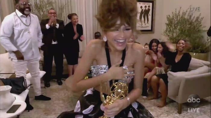 Zendaya accepting her Emmy surrounded by family