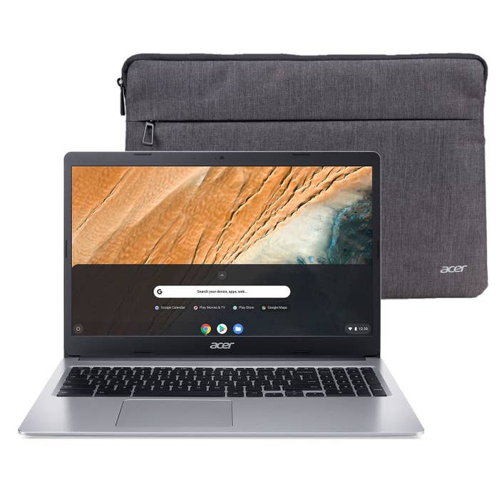 The silver laptop and sleeve