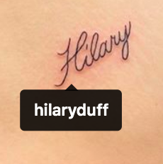 A zoomed in photo of the Hilary tattoo