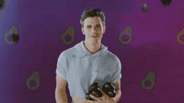 Antoni throwing a bunch of avocados in the air.
