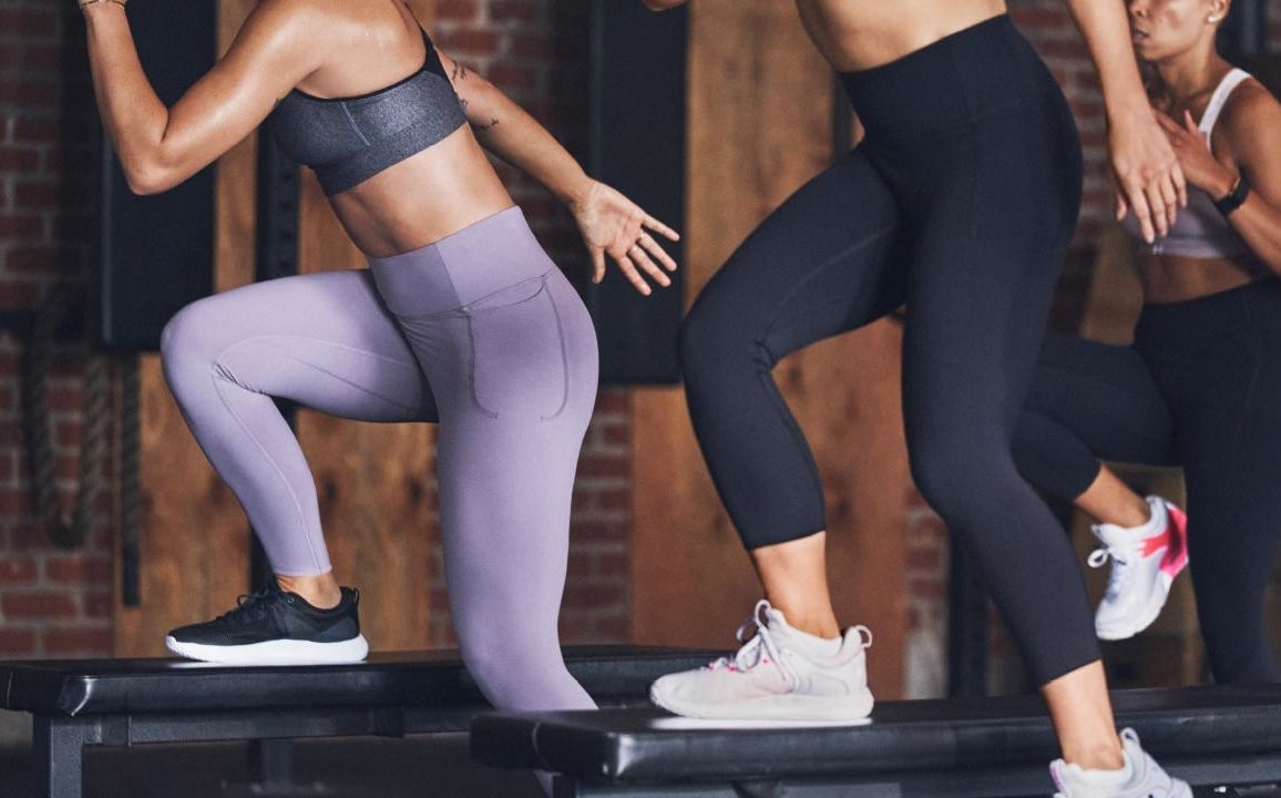 Three people working out while wearing the leggings