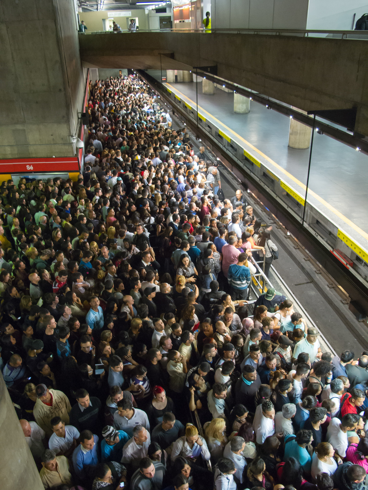 A very crowded subway station.