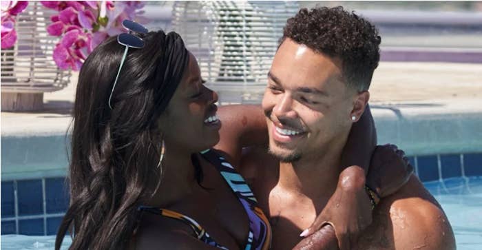 &quot;Love Island&quot; stars Justine and Caleb staring at each other lovingly in the pool