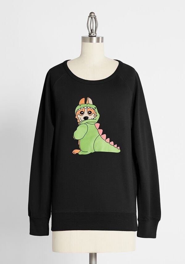The black sweatshirt emblazoned with a corgi on its back legs in a green dinosaur outfit