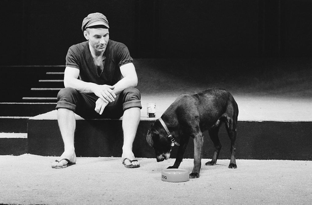 Sitting with a dog in black and white