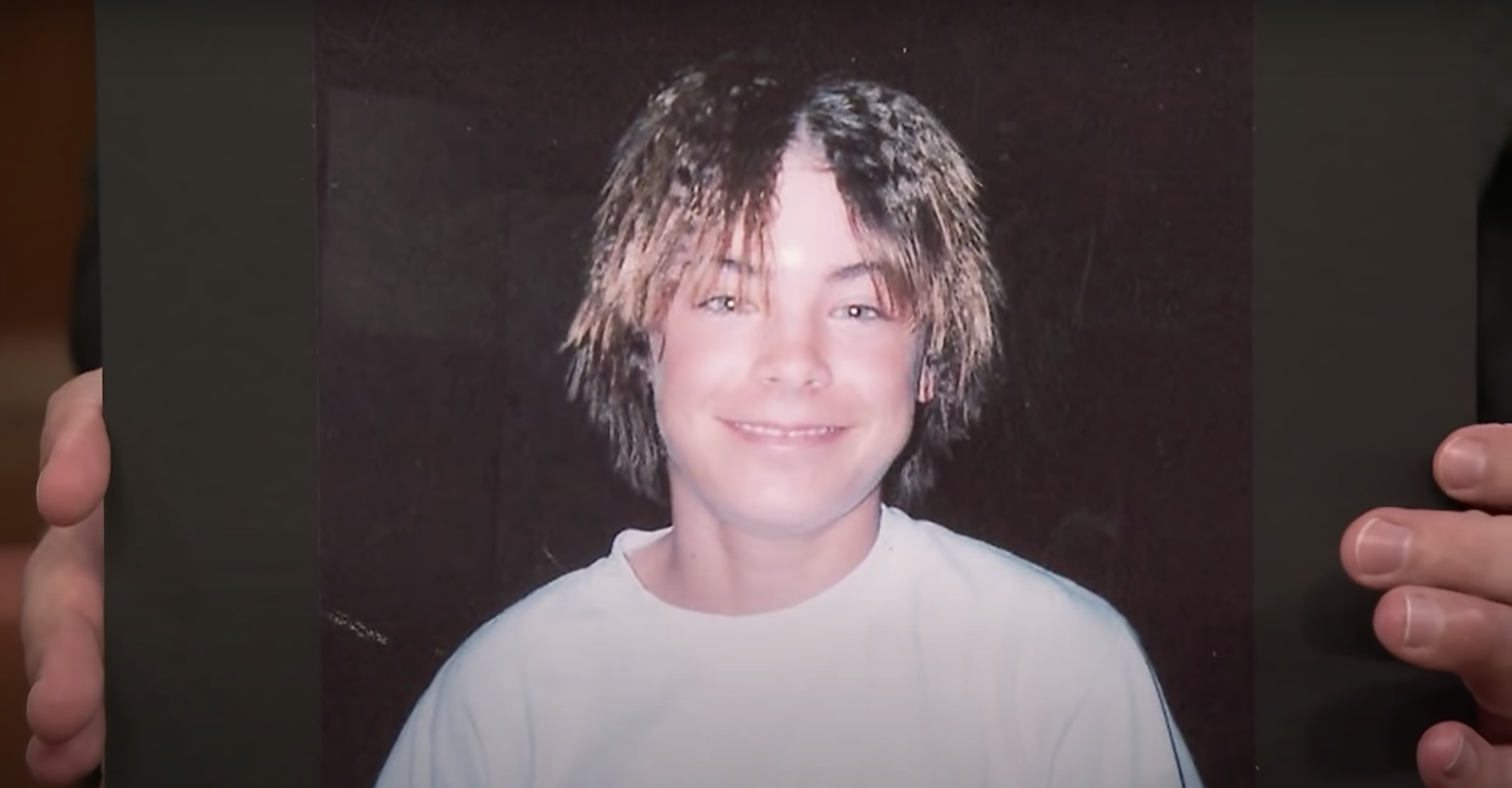 Young Zac Efron with crimped hair
