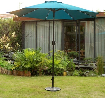 the standing umbrella in teal