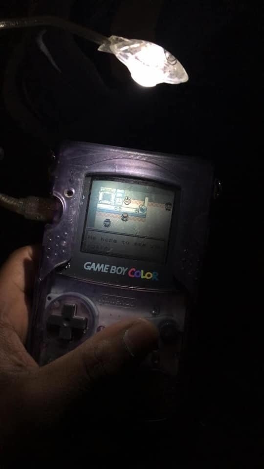 gameboy illuminated by a light