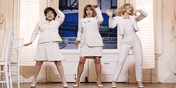 Elise, Brenda, and Annie dance together