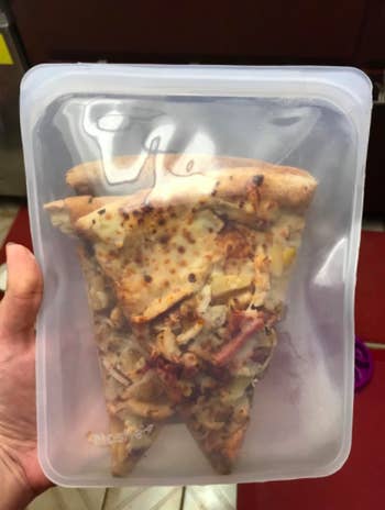a couple slices of pizza in a clear half gallon version