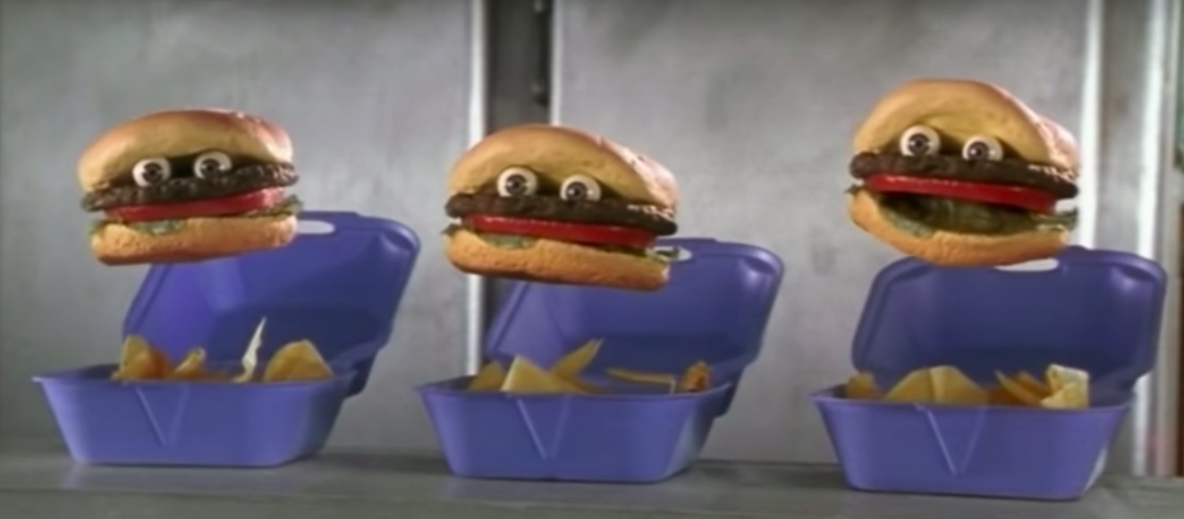 Three floating Good Burgers with eyes