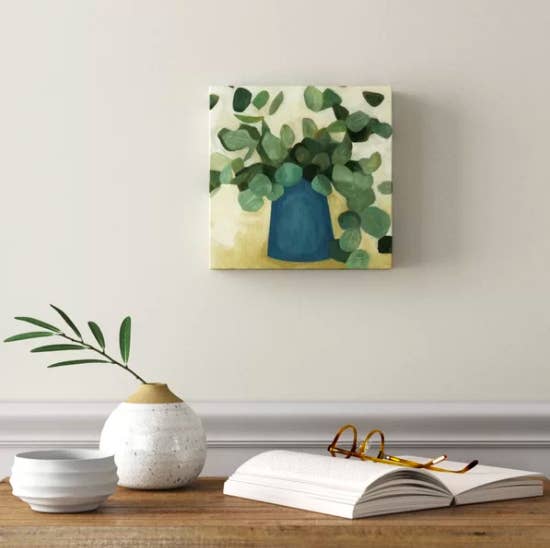 Abstract canvas art of leaf-filled pot