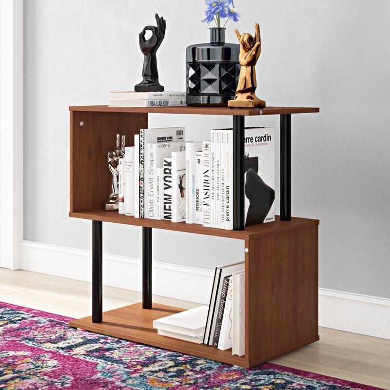 Modern wood shelf in the shape of an &quot;S&quot; with medal legs holding each shelf up