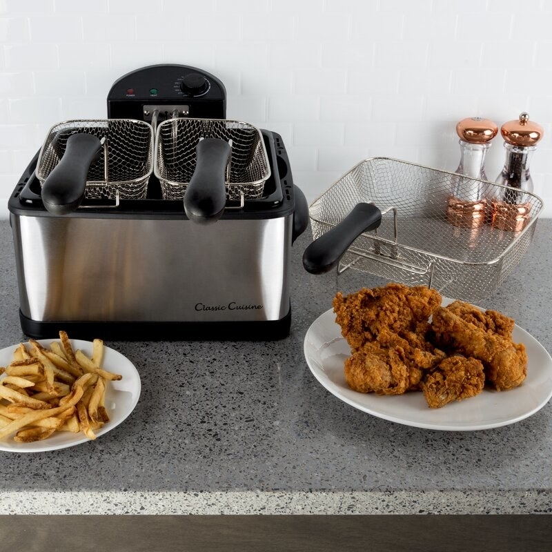 A deep fryer with two baskets 