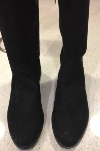 reviewer photo of suede black boots with no scuff marks 
