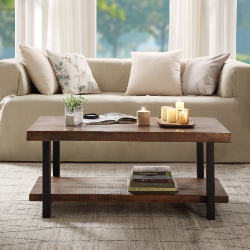 The dark wood rectangular coffee table