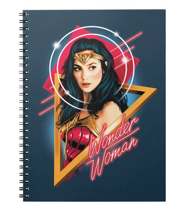 A notebook with Gal Gadot Wonder Woman in 1980s style