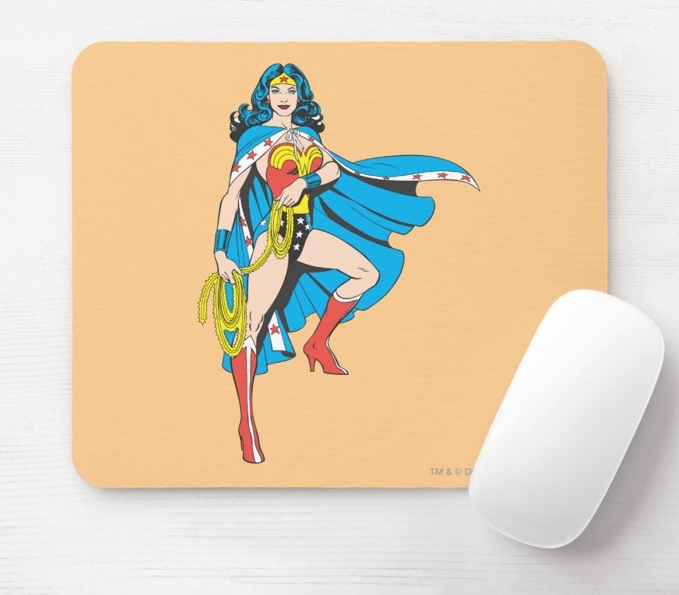 A light orange mousepad with classic Wonder Woman art