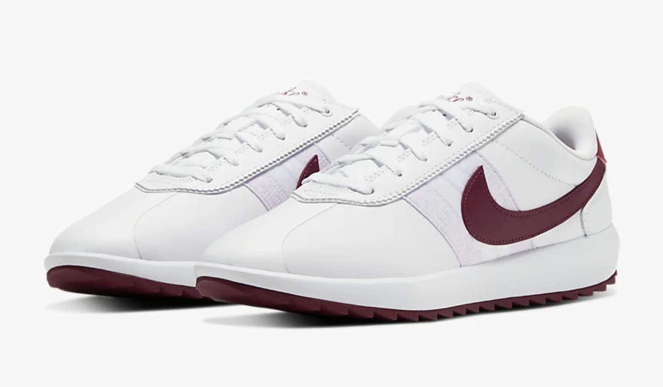 The sneakers in white with maroon swishes and bottoms 
