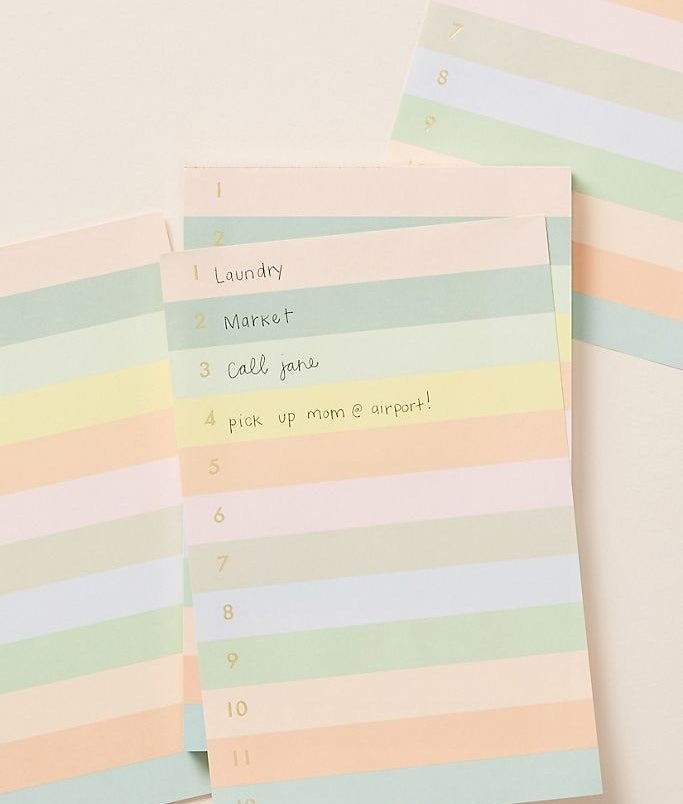 A cute multi-colored pastel notepad featuring numbers 1 to 12 in gold