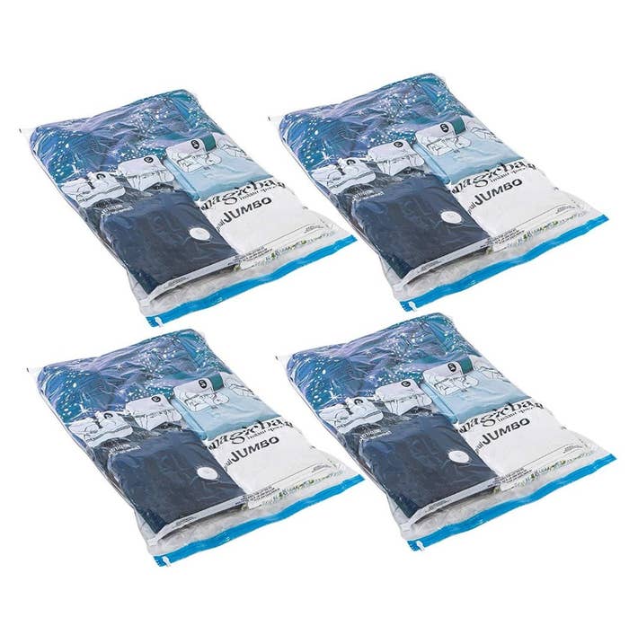 The storage bags being used to hold clothing in hues of blue
