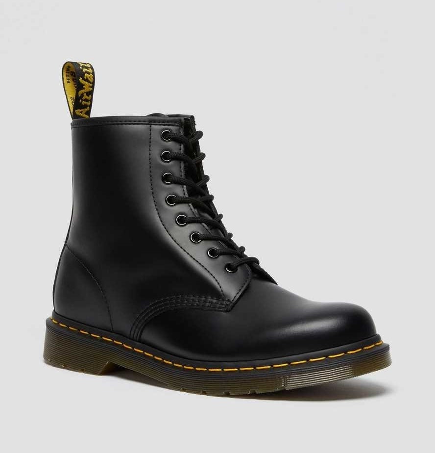 The high-top leather boots in black with black laces, yellow stitching, and a slight heel