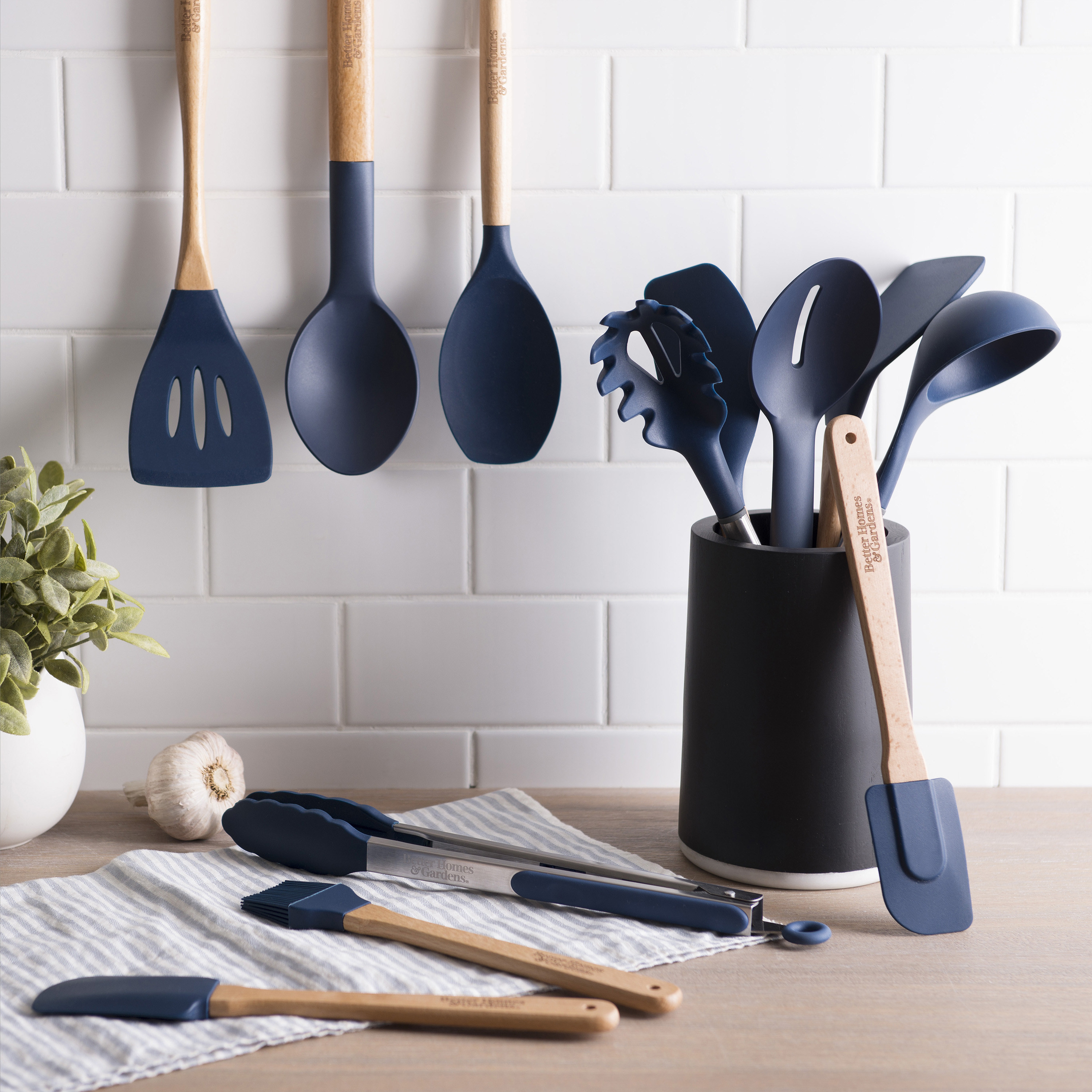 All 12 of the utensils in the set showcased in a kitchen