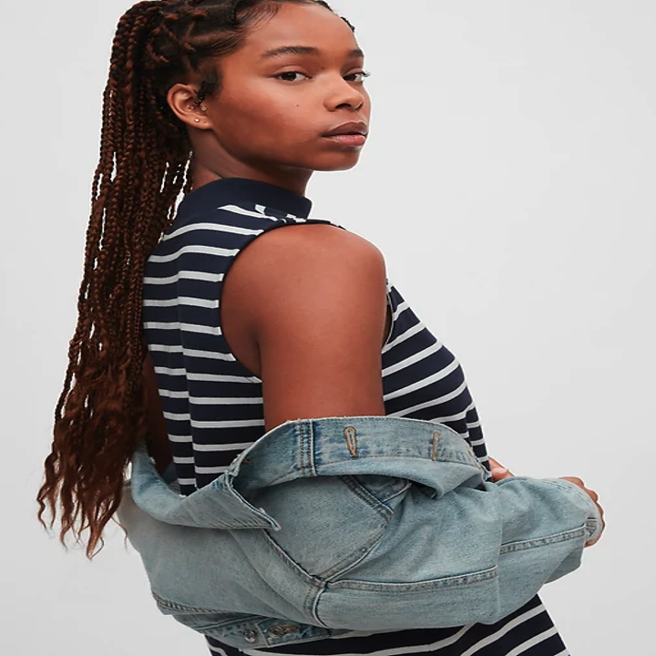 The dress also comes in a black and white striped print