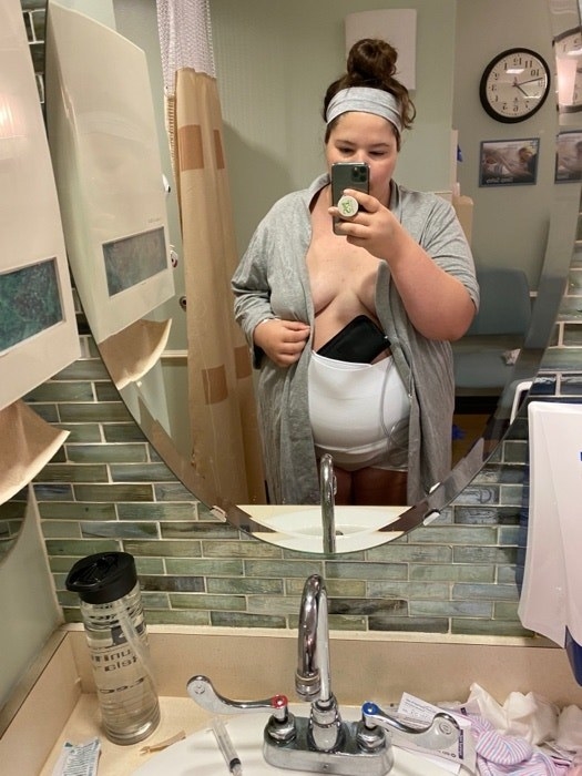 Photo of woman in hospital bathroom.