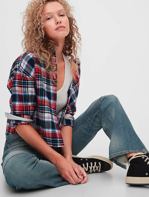 Model wearing the plaid shirt