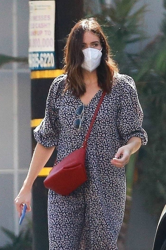 Mandy Moore shows off her growing baby bump on Saturday afternoon