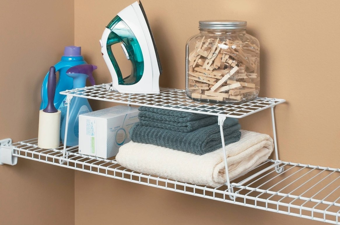 The white rack being used to hold laundry products