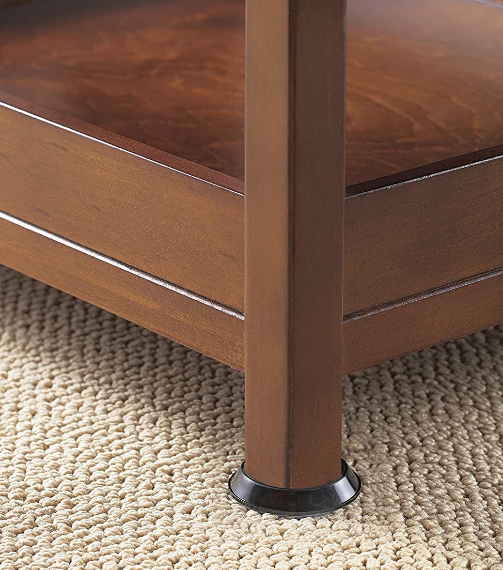 The sliders on the bottom of a table leg