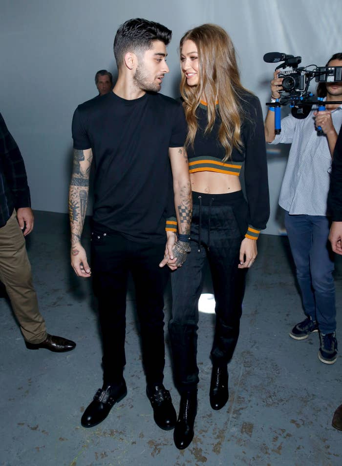 Zayn Malik and Gigi Hadid attend the Versus Versace show