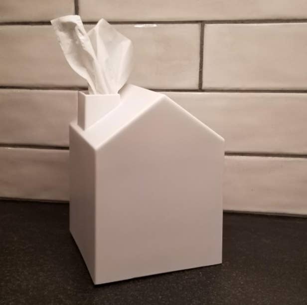 white house-shaped tissue box cover