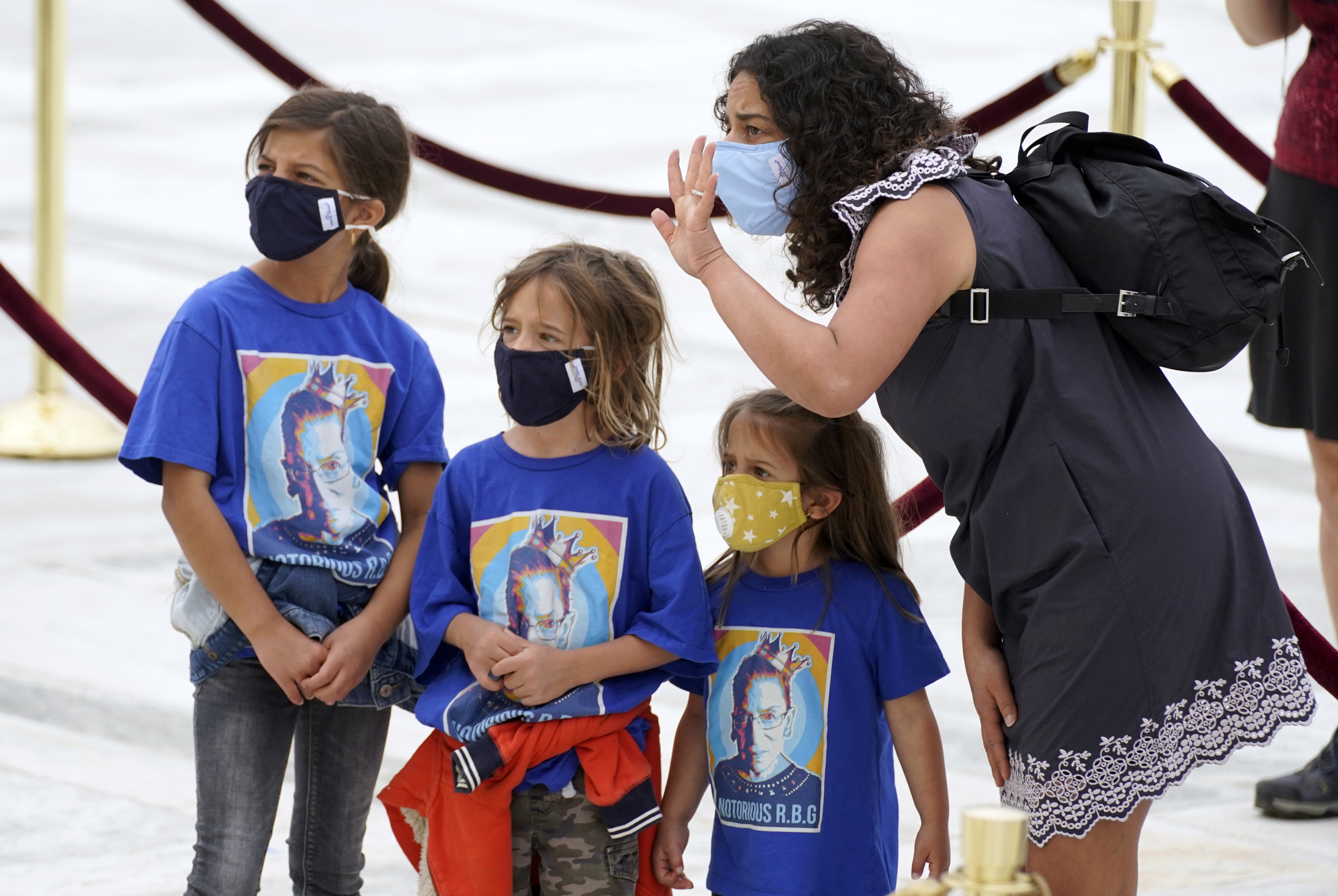 Three kids wear shirts that say Notorious RGB