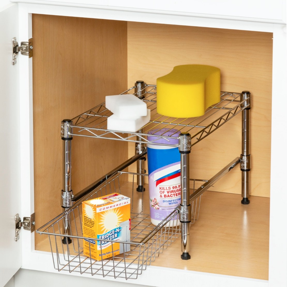 The under-the-cabinet storage item being used to hold cleaning products