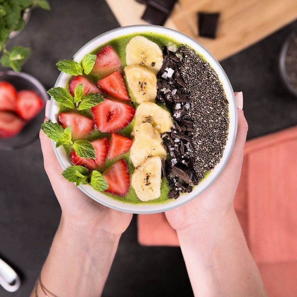 The bowl filled with acai and fruit