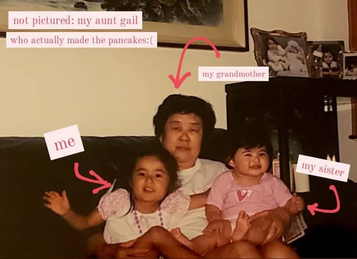 The writer as a child with her younger sister sitting on their grandmother&#x27;s lap with a note, &quot;Not pictured: My Aunt Gail who actually made the pancakes&quot;